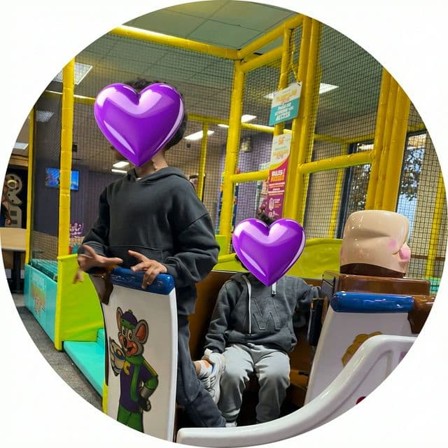 Children playing in trampoline area